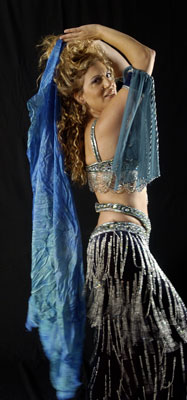 Sigal performing in blue belly dance costume